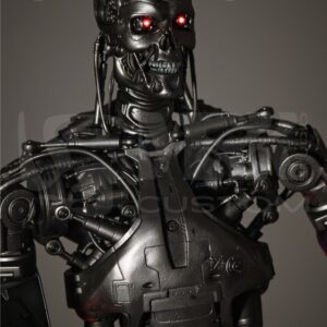 Close-up of T-800 Endoskeleton head with LED-lit red eyes and hand-painted metal finish.