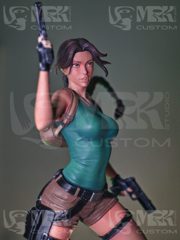 Close-up of Lara Croft figure showing impressive hand-painted detail on face and outfit.