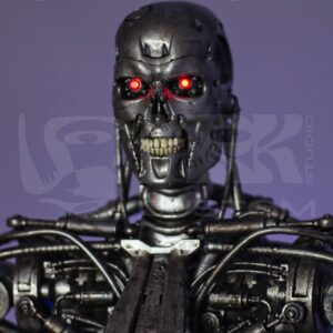 Close-up of hand-painted Terminator T-800 head with detailed sculpting and LED lighting.