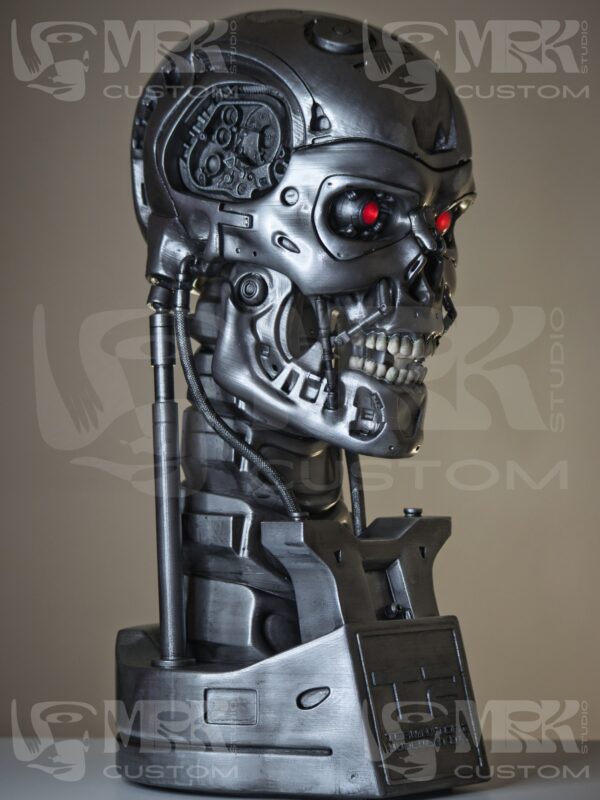 Custom-made Terminator head replica with LED lighting, ideal for sci-fi collections.